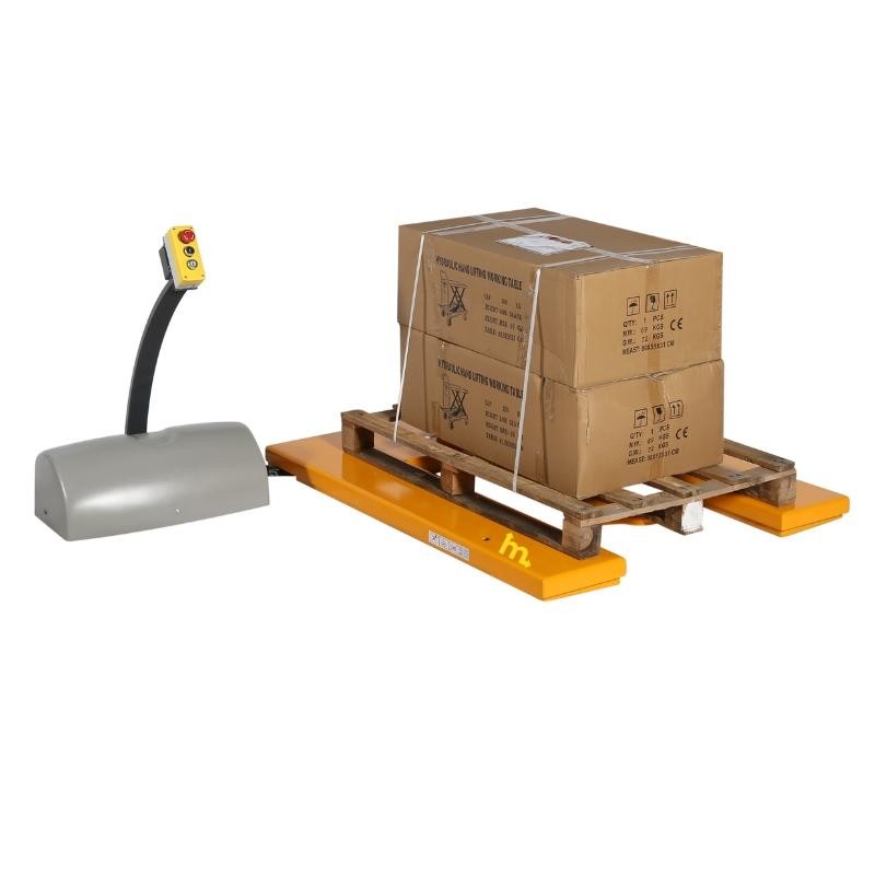 Mesa elevadora en E 220V en posición baja con paleta y 	mercancía